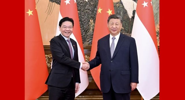 习近平会见新加坡总理黄循财